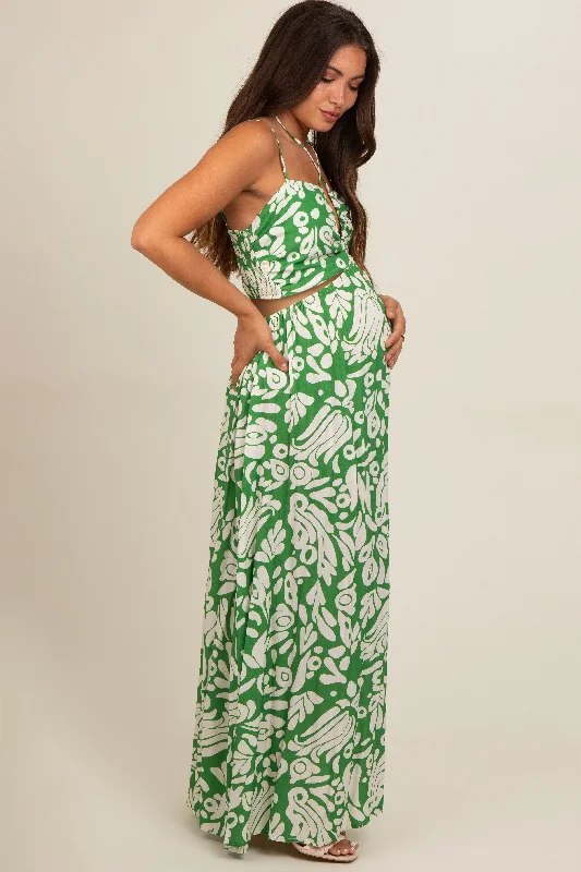 green-printed-halter-cut-out-maternity-maxi-dress