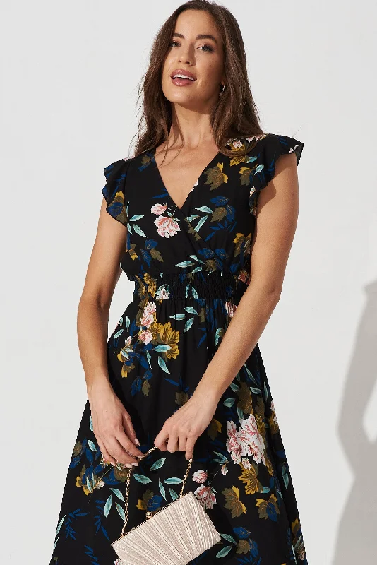 pescara-midi-dress-in-black-with-green-leaf