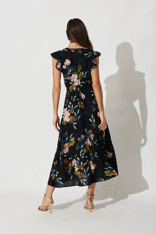 pescara-midi-dress-in-black-with-green-leaf