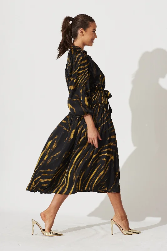 pippa-maxi-dress-in-black-with-yellow-print