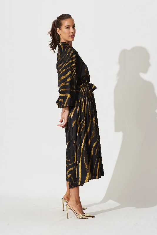 pippa-maxi-dress-in-black-with-yellow-print