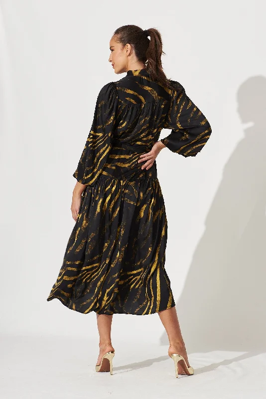 pippa-maxi-dress-in-black-with-yellow-print